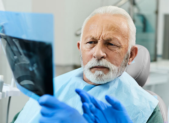 Presenting dental x-ray to patient