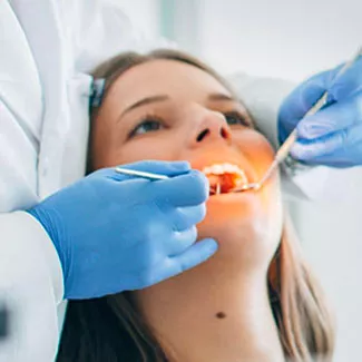 Woman undergoing hygiene appointment