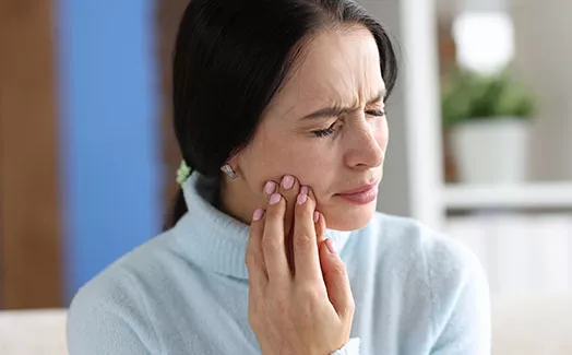 Woman experiencing tooth pain